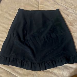 Black mini skirt. Size small. Bought from boutique.